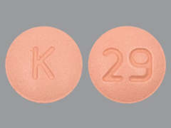 This is a peach round Tablet imprinted with K on the front, 29 on the back, and is manufactured by AUROBINDO PHARM.
