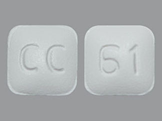 Esto es un Tableta imprimido con CC en la parte delantera, 61 en la parte posterior, y es fabricado por None.