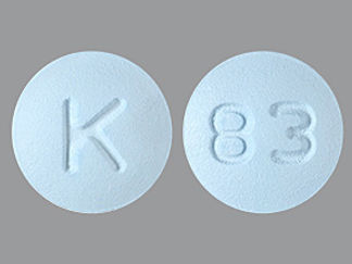 This is a Tablet imprinted with K on the front, 83 on the back.