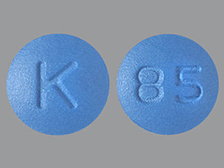 This is a Tablet imprinted with K on the front, 85 on the back.