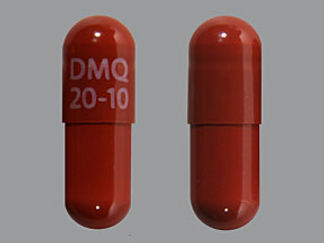 Esto es un Cápsula imprimido con DMQ  20-10 en la parte delantera, nada en la parte posterior, y es fabricado por None.