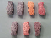 Flintstones With Extra C: Esto es un Tableta Masticable assorted assorted imprimido con nada en la parte delantera, nada en la parte posterior, y es fabricado por BAYER INC..