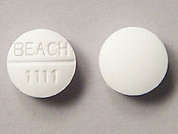 K-Phos Original: This is a white round Tablet Soluble imprinted with BEACH  1111 on the front, nothing on the back, and is manufactured by BEACH PRODUCTS.