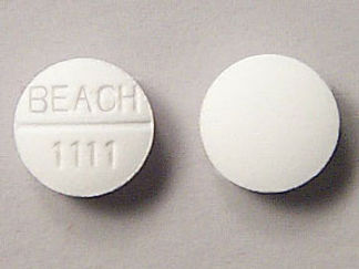 This is a Tablet Soluble imprinted with BEACH  1111 on the front, nothing on the back.