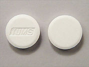 Tums: This is a Tablet Chewable imprinted with TUMS on the front, nothing on the back.