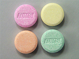 This is a Tablet Chewable imprinted with TUMS on the front, nothing on the back.