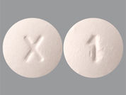 Exemestane: This is a Tablet imprinted with X on the front, 1 on the back.