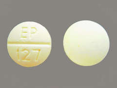 This is a yellow round Tablet imprinted with EP  127 on the front, nothing on the back, and is manufactured by LEADING PHARMA.