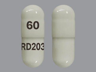This is a Capsule Er 24hr imprinted with 60 on the front, RD203 on the back.