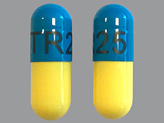 This is a Capsule imprinted with TR25 on the front, nothing on the back.