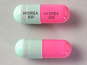 Hydrea: Esto es un Cápsula imprimido con HYDREA  830 en la parte delantera, HYDREA  830 en la parte posterior, y es fabricado por None.