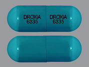 Droxia: Esto es un Cápsula imprimido con DROXIA  6335 en la parte delantera, DROXIA  6335 en la parte posterior, y es fabricado por None.