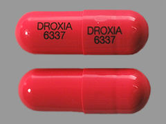 Esto es un Cápsula imprimido con DROXIA  6337 en la parte delantera, DROXIA  6337 en la parte posterior, y es fabricado por None.