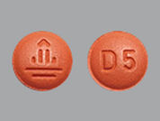 Tradjenta: Esto es un Tableta imprimido con D5 en la parte delantera, logo en la parte posterior, y es fabricado por None.