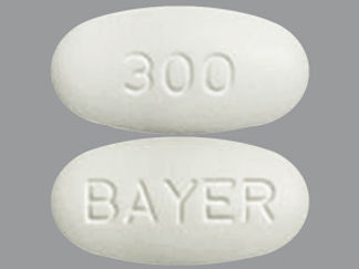 Esto es un Tableta imprimido con 300 en la parte delantera, BAYER en la parte posterior, y es fabricado por None.