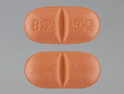 Oxcarbazepine: This is a Tablet imprinted with B2 92 on the front, nothing on the back.