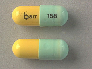 This is a Capsule imprinted with barr on the front, 158 on the back.