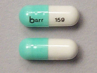 This is a Capsule imprinted with barr on the front, 159 on the back.