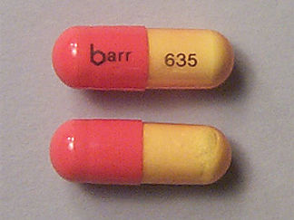 This is a Capsule imprinted with barr on the front, 635 on the back.