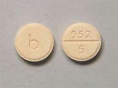 This is a peach round Tablet imprinted with b on the front, 952  5 on the back, and is manufactured by TEVA USA.