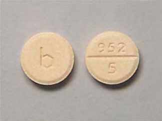This is a Tablet imprinted with b on the front, 952  5 on the back.