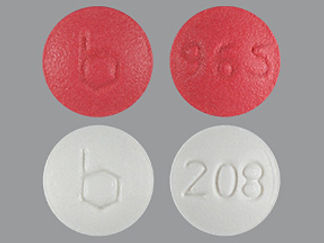 This is a Tablet imprinted with b on the front, 965 or 208 on the back.