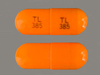 This is a Capsule imprinted with TL  385 on the front, TL  385 on the back.