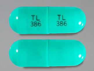 This is a Capsule imprinted with TL  386 on the front, TL  386 on the back.