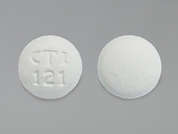 Famotidine: This is a white round Tablet imprinted with CTI  121 on the front, nothing on the back, and is manufactured by CARLSBAD TECH.
