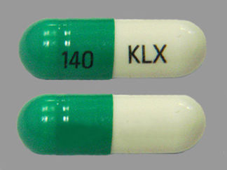 This is a Capsule imprinted with 140 on the front, KLX on the back.