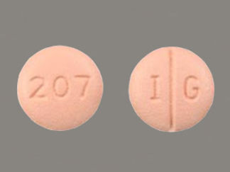 This is a Tablet imprinted with I G on the front, 207 on the back.