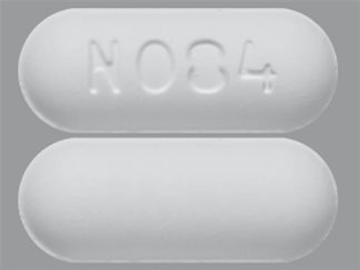 This is a Tablet imprinted with N084 on the front, nothing on the back.