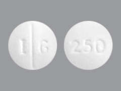 This is a white round Tablet imprinted with I G on the front, 250 on the back, and is manufactured by EXELAN PHARMACE.