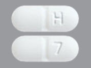 Nevirapine: This is a Tablet imprinted with H on the front, 7 on the back.