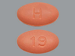 Esto es un Tableta ladrillo rojo oval imprimido con H en la parte delantera, 19 en la parte posterior, y es fabricado por CAMBER PHARMACE.