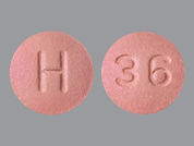 Finasteride: This is a Tablet imprinted with H on the front, 36 on the back.