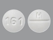 Levocetirizine Dihydrochloride: This is a Tablet imprinted with 161 on the front, H on the back.