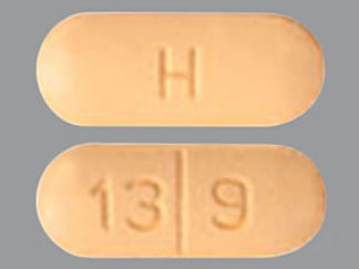 This is a Tablet imprinted with H on the front, 13 9 on the back.