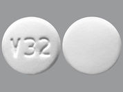 Albendazole: This is a Tablet imprinted with logo and 32 on the front, nothing on the back.