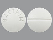 Bactrim: This is a Tablet imprinted with BACTRIM on the front, nothing on the back.