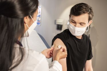 Medical professional administering a vaccination