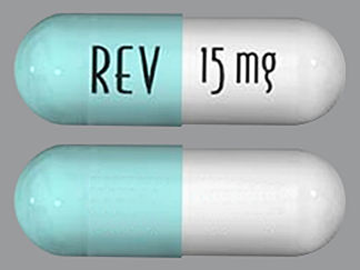 This is a Capsule imprinted with REV on the front, 15 mg on the back.