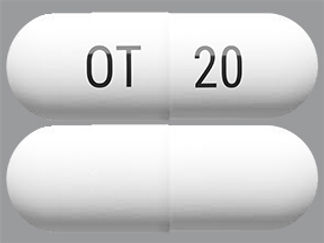 This is a Capsule Dr imprinted with OT on the front, 20 on the back.