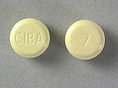This is a yellow round Tablet imprinted with CIBA on the front, 7 on the back, and is manufactured by SANDOZ INC..