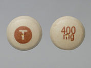 Tegretol Xr: Esto es un Tableta Er 12 Hr imprimido con T en la parte delantera, 400  mg en la parte posterior, y es fabricado por None.