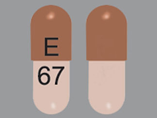 This is a Capsule Dr imprinted with E on the front, 67 on the back.