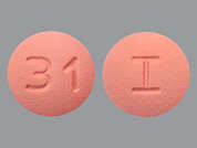 Rosuvastatin Calcium: Esto es un Tableta rosado redondo imprimido con I en la parte delantera, 31 en la parte posterior, y es fabricado por ACETRIS HEALTH.