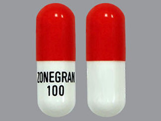 This is a Capsule imprinted with ZONEGRAN  100 on the front, nothing on the back.