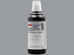 This is a light blue Mouthwash imprinted with nothing on the front, nothing on the back, and is manufactured by COLGATE ORAL PH.