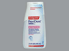 This is a turquoise Paste imprinted with nothing on the front, nothing on the back, and is manufactured by COLGATE ORAL PH.